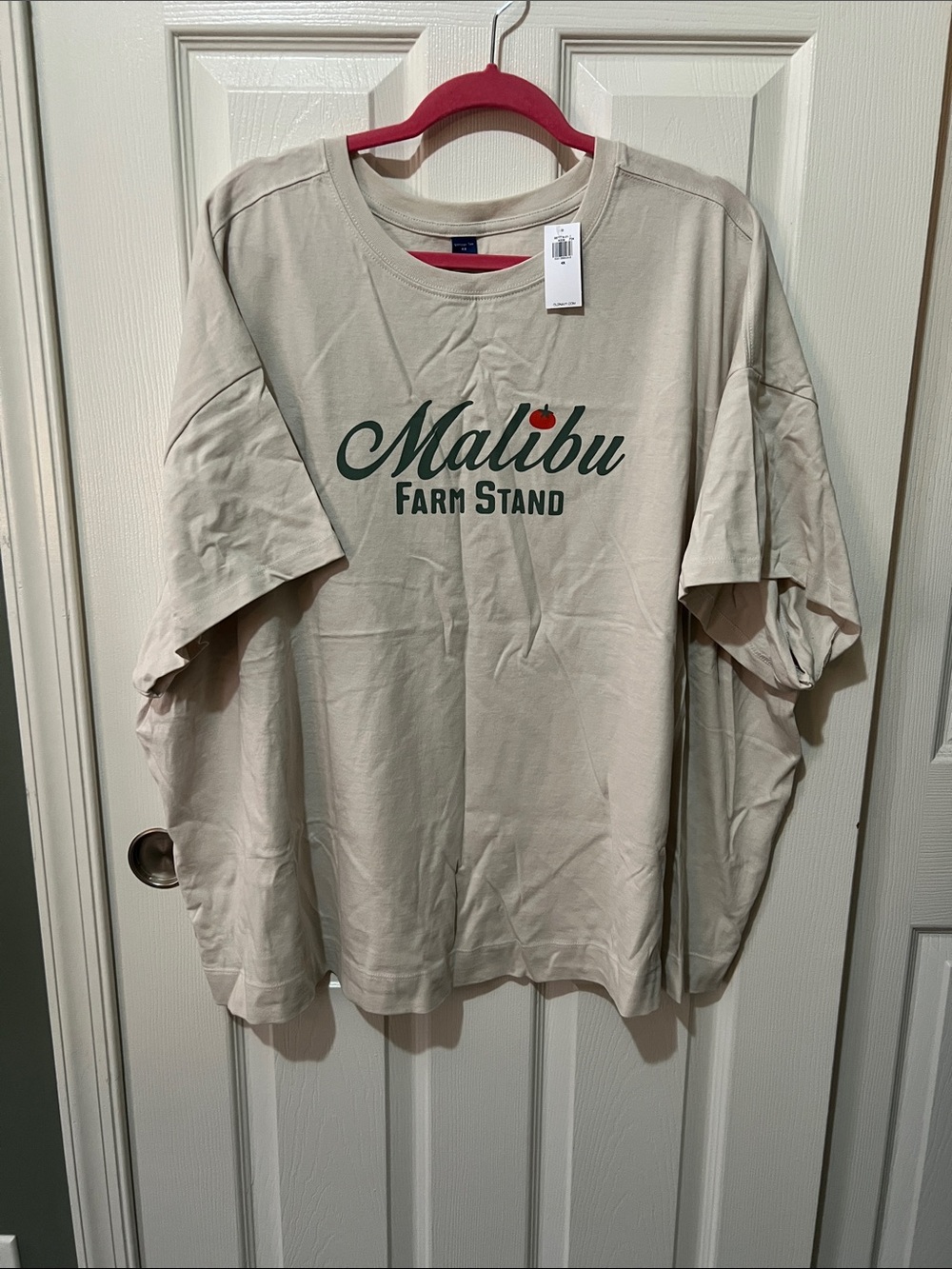 Malibu Beige Graphic Tee with Dark Green Logo